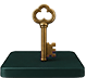 Antique gold-colored key mounted upright on a dark green velvet display box under a glass cover