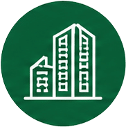 Circular green emblem featuring a white minimalist skyline with three tall buildings