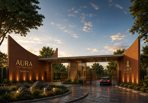 Brick entrance to Aura Lords' Estates Community with a gate, illuminated signage, and a car arriving at dusk behind landscaped gardens.