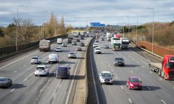 Aerial view of a multi-lane highway — Lords of the Lands