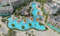 Aerial view of a lagoon-style clubhouse pool — Lords of the Lands