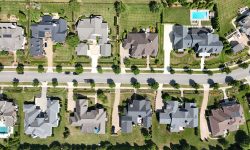 Aerial view of planned housing rooftops — Lords of the Lands