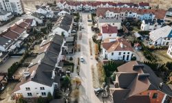 Aerial view of a villa community street — Lords of the Lands